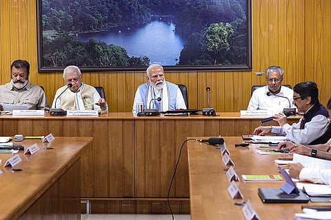 PM Modi during a meeting to review damages caused by recent landslides, in Wayanad